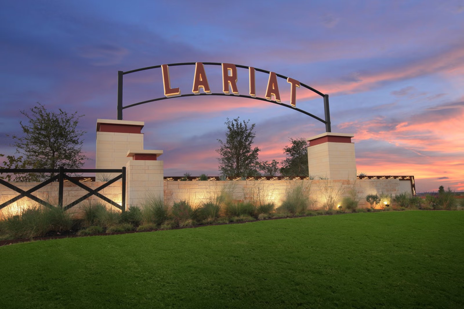Lariat entrance sign at sunset in Liberty Hill, Texas