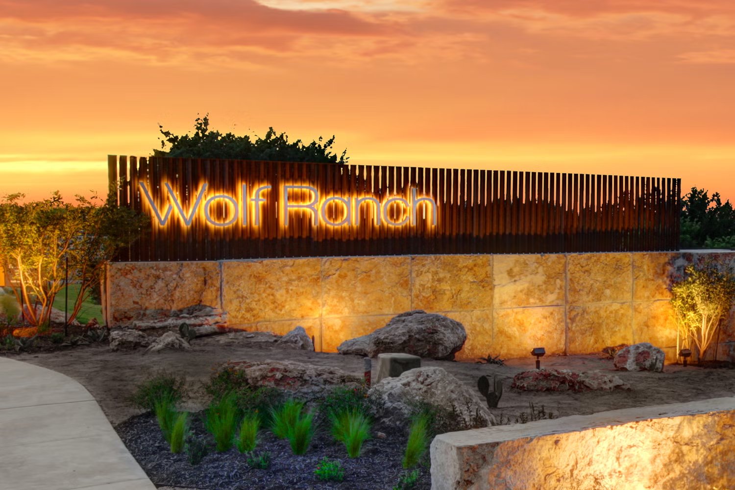 Wolf Ranch entrance sign at sunset in Georgetown, Texas